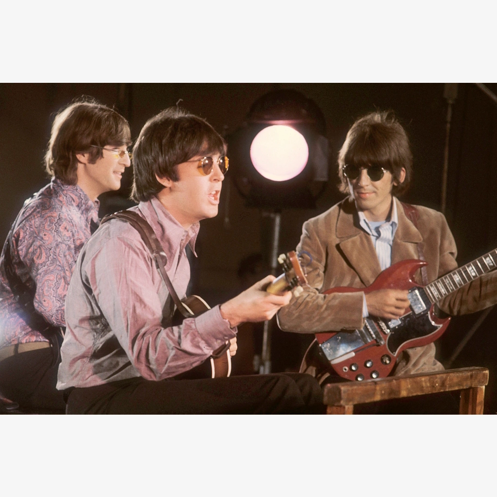 An interior spread, featuring a photograph of The Beatles